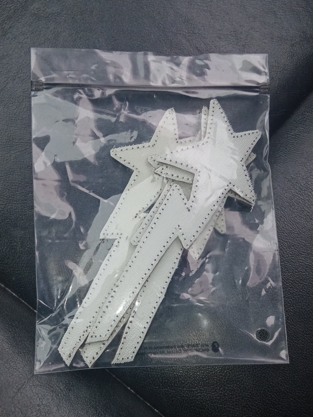 This is a set of official A Bathing Ape (BAPE) "STA" logo patches, 4 Pack